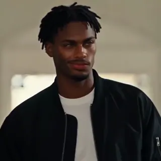 0:09–0:10 — The clip ends on a closer view of a face turning to the side with a slight smile.